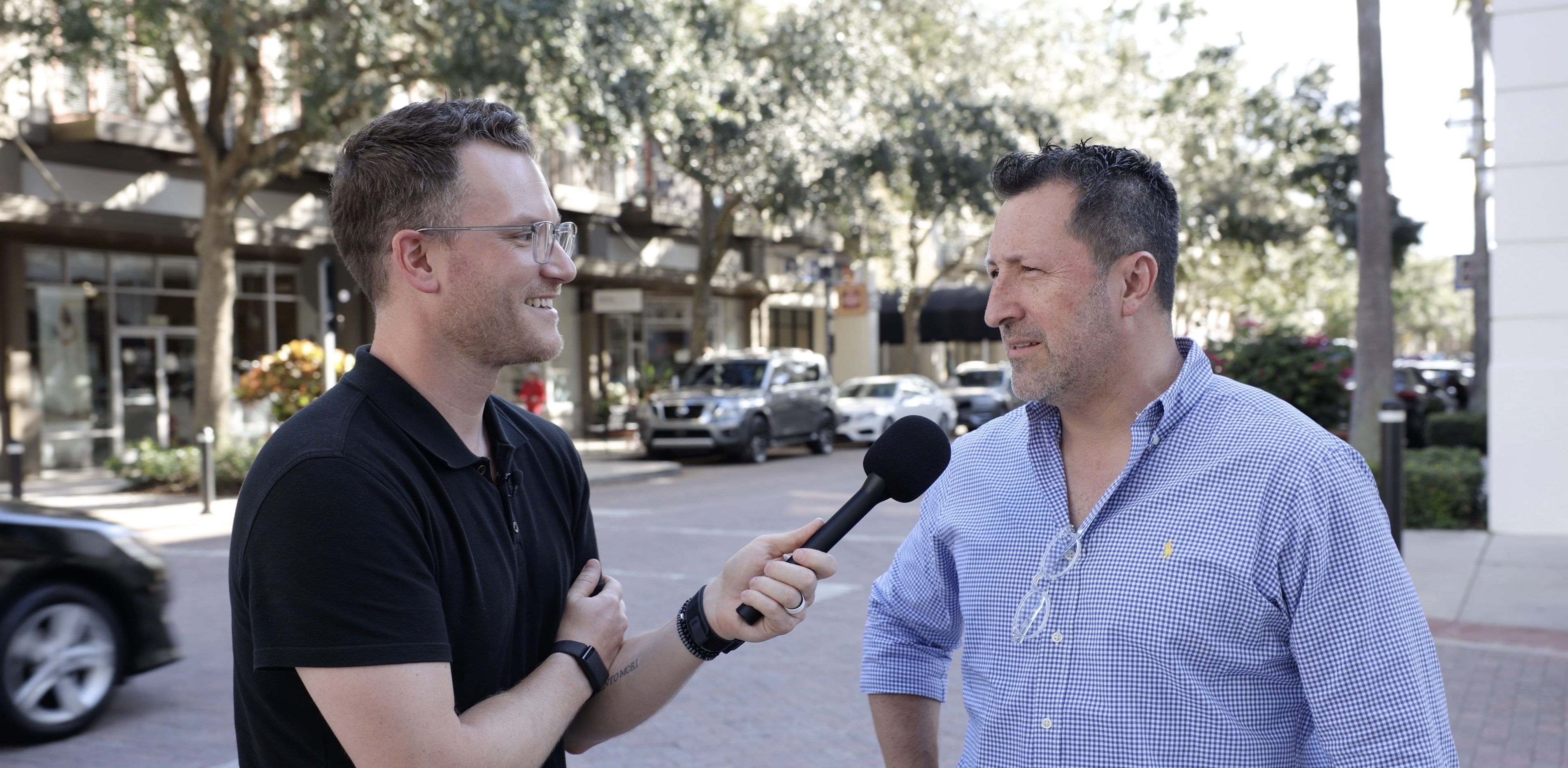 man interviewing another man